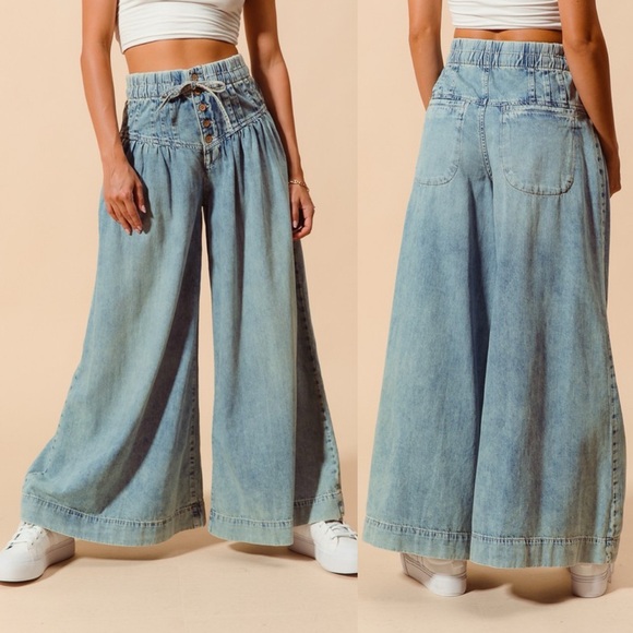 Anthropologie Pants - Light wash wood button drawstring waist wide leg flare boho bohemian jeans